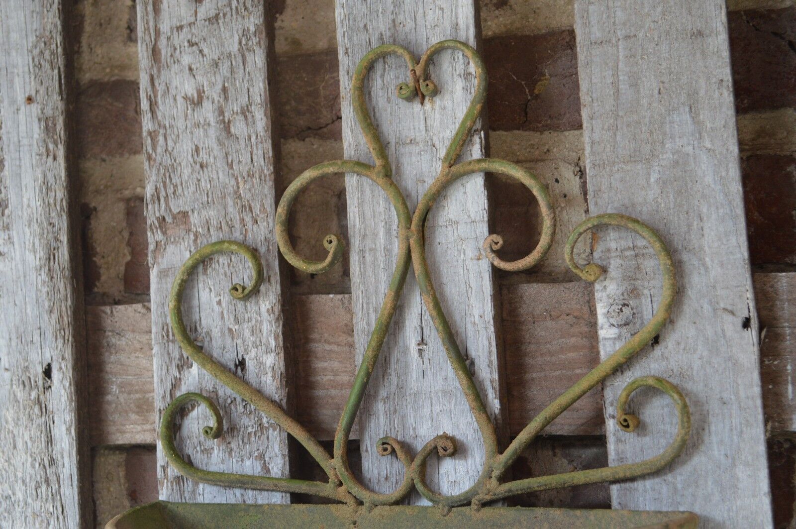 Patinated iron wall planter