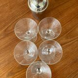 Shaker and five cocktail glasses