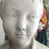 Cherub bust in platter