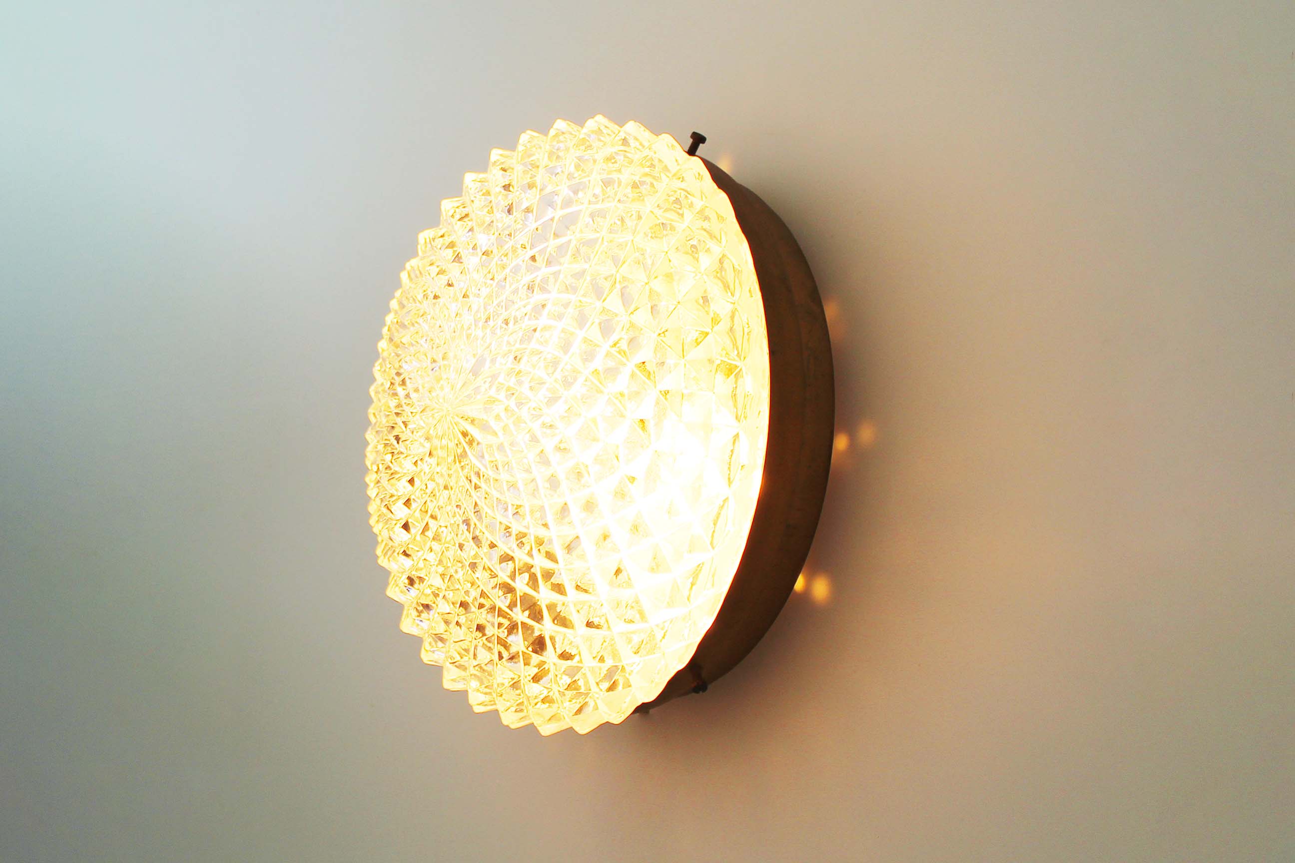 1970's Heavy round crystal glass wall sconce by Massive Belgium