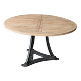 Industrial table with cast iron legs and teak top