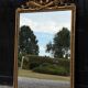 Louis XVI mirror in carved and gilded wood, 18th century