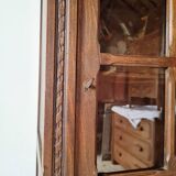 Old glass-fronted library in solid wood