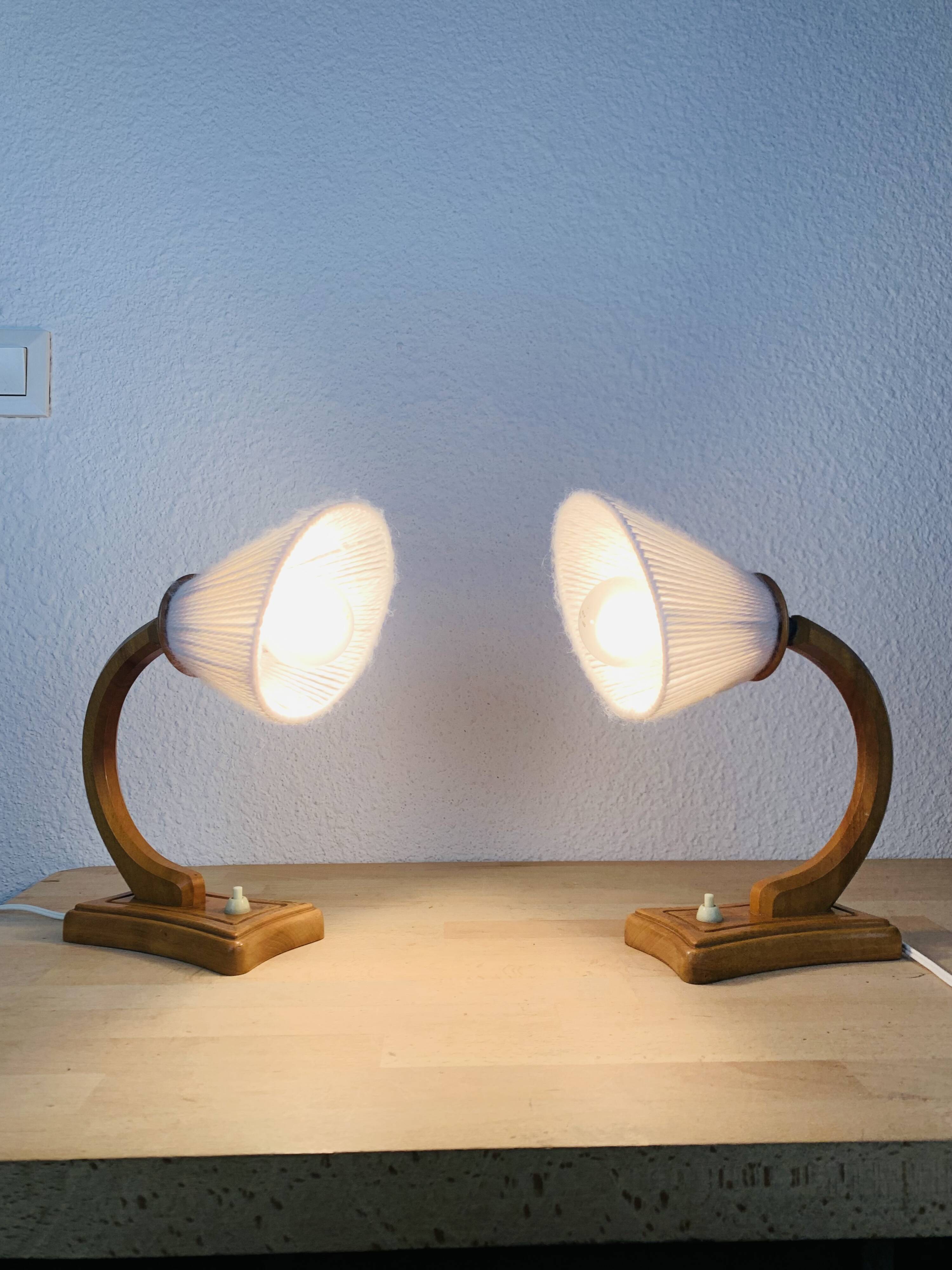 Pair of art deco lamps in curved wood and wool