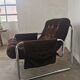 Velvet and tubular metal armchair 1980