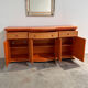 Vintage rattan & wood orange curved sideboard, 1980s