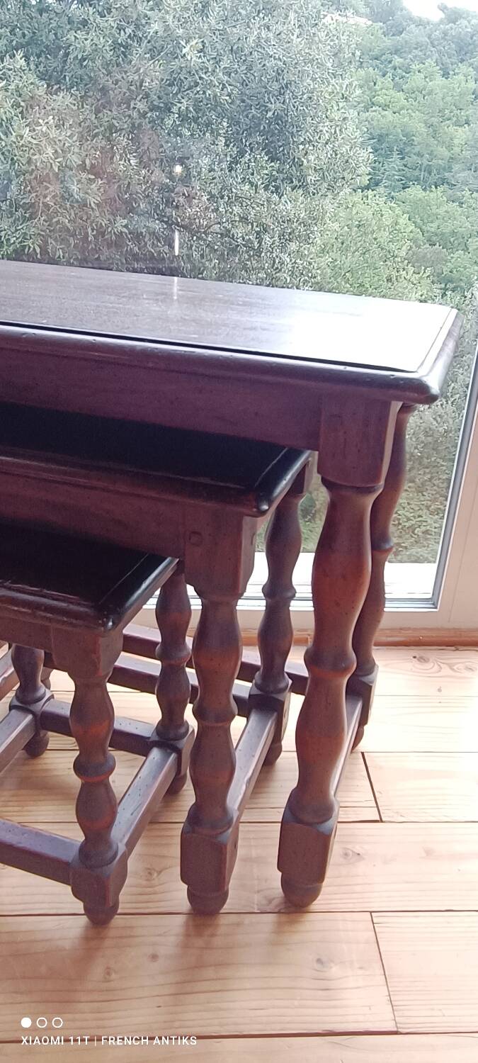 nesting tables made of oak. Turned wooden legs.