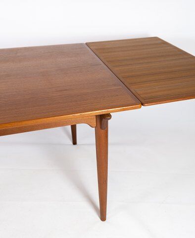 Dining table in teak with extentions of danish design from the 1960s.