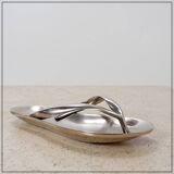 Aluminum pocket emptier flip flop