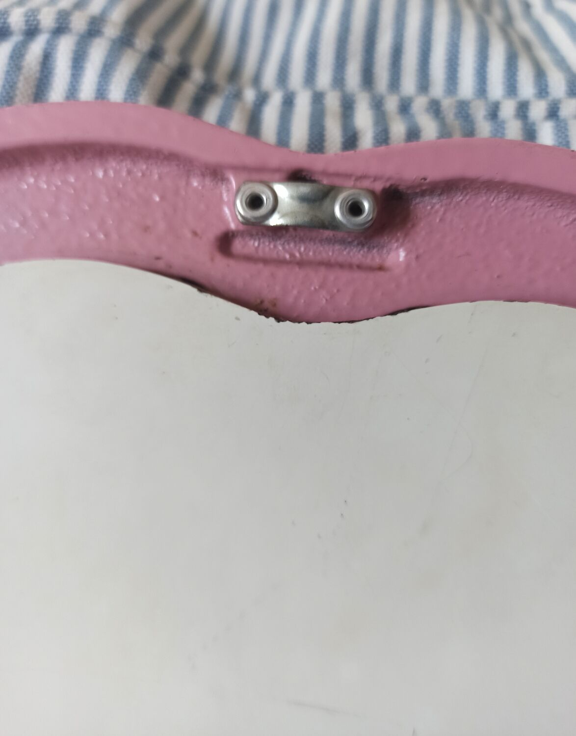 Vintage pink oval cast iron mirror