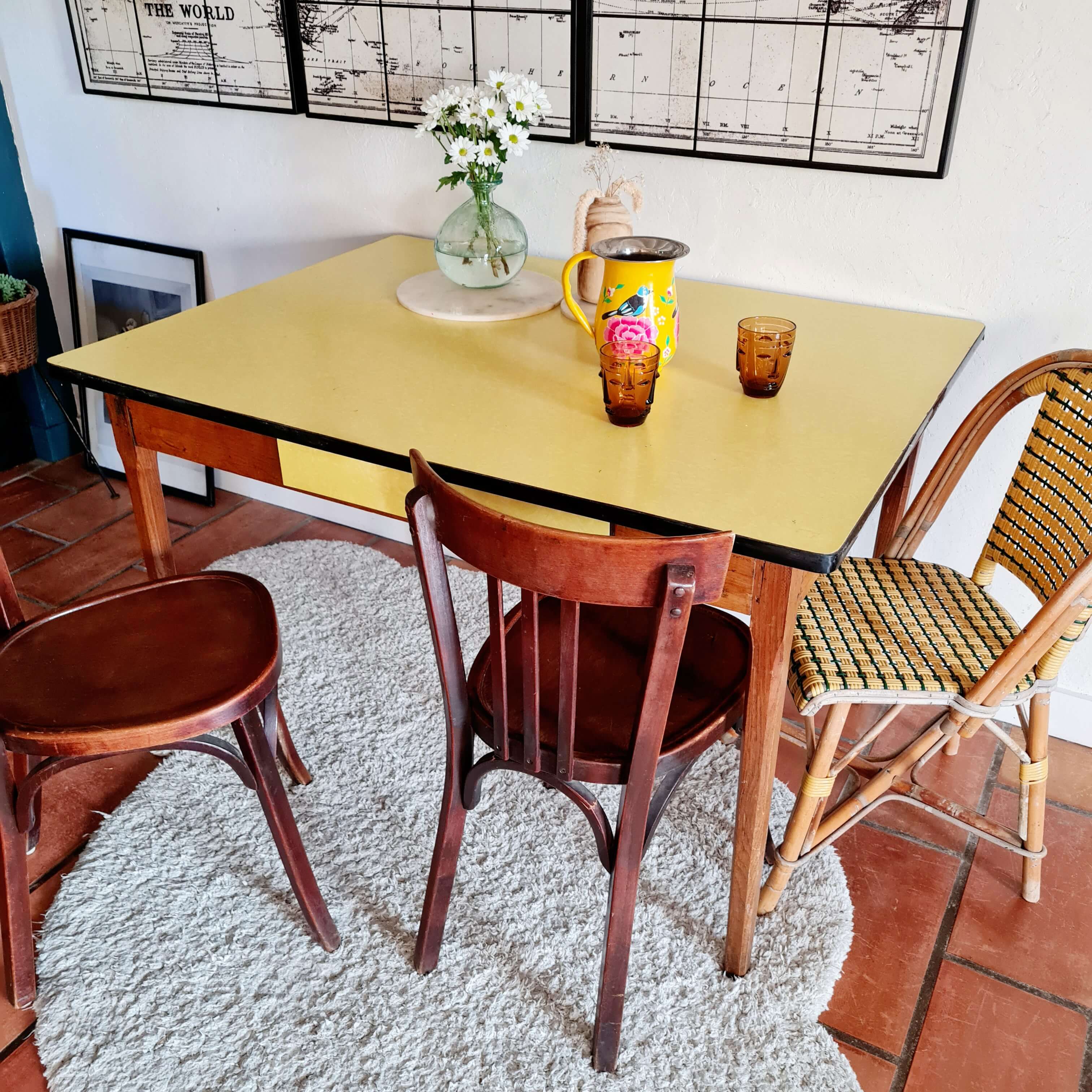 Old wooden farmhouse table and yellow formica top
