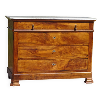 Walnut chest of drawers in the Louis Philippe style and period.