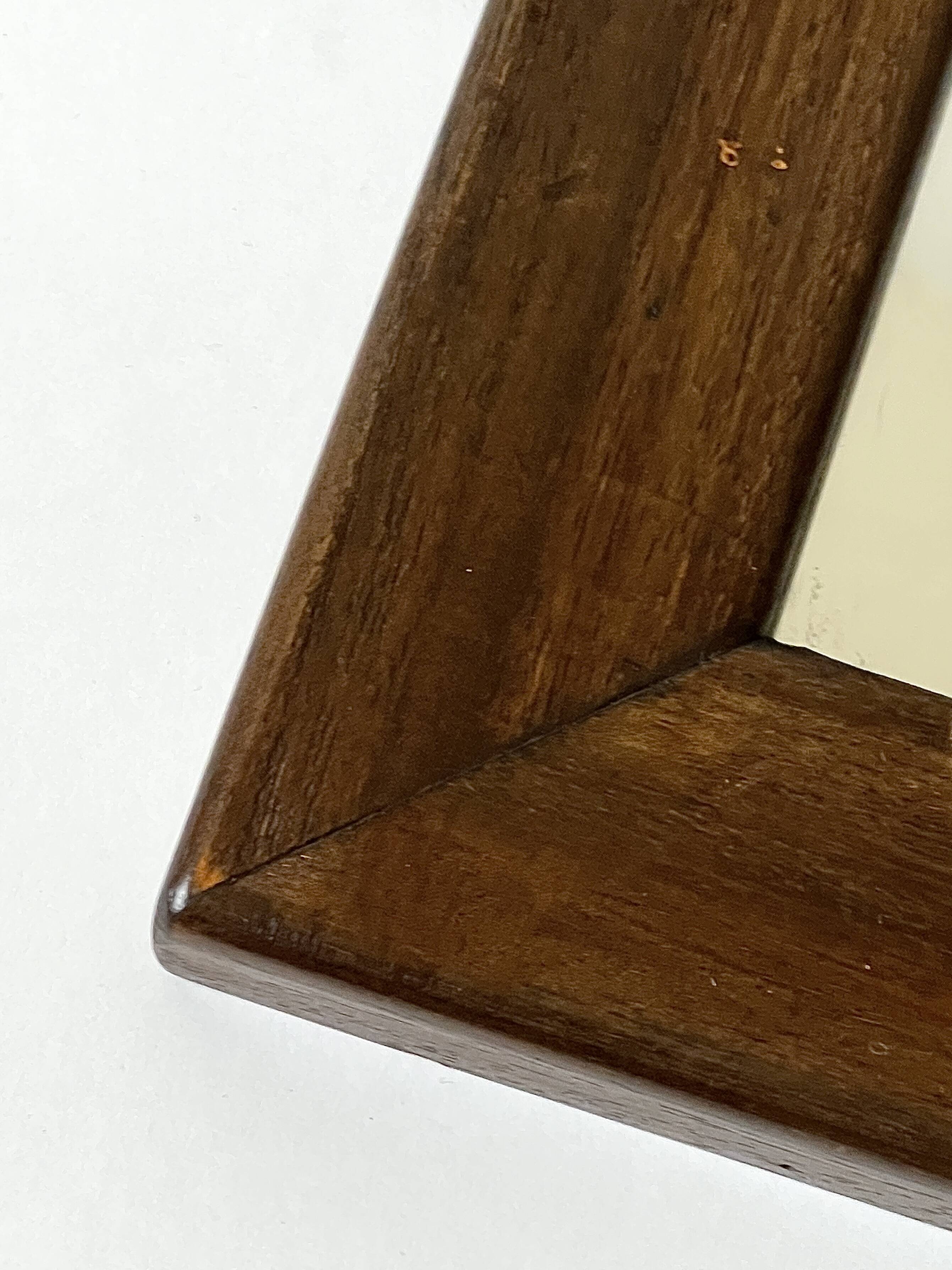 Brutalist rectangular wall mirror in solid wood, France 1950.