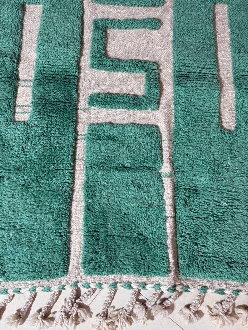 Beni Ourain Berber rug made of natural wool, traditionally handwoven.
