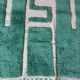 Beni Ourain Berber rug made of natural wool, traditionally handwoven.