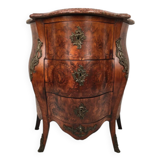 Louis XV style chest of drawers, richly inlaid, animated front and side. 19th century