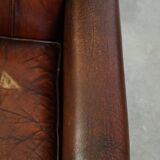 Characterful vintage design armchair made from beautifully patinated sheepskin