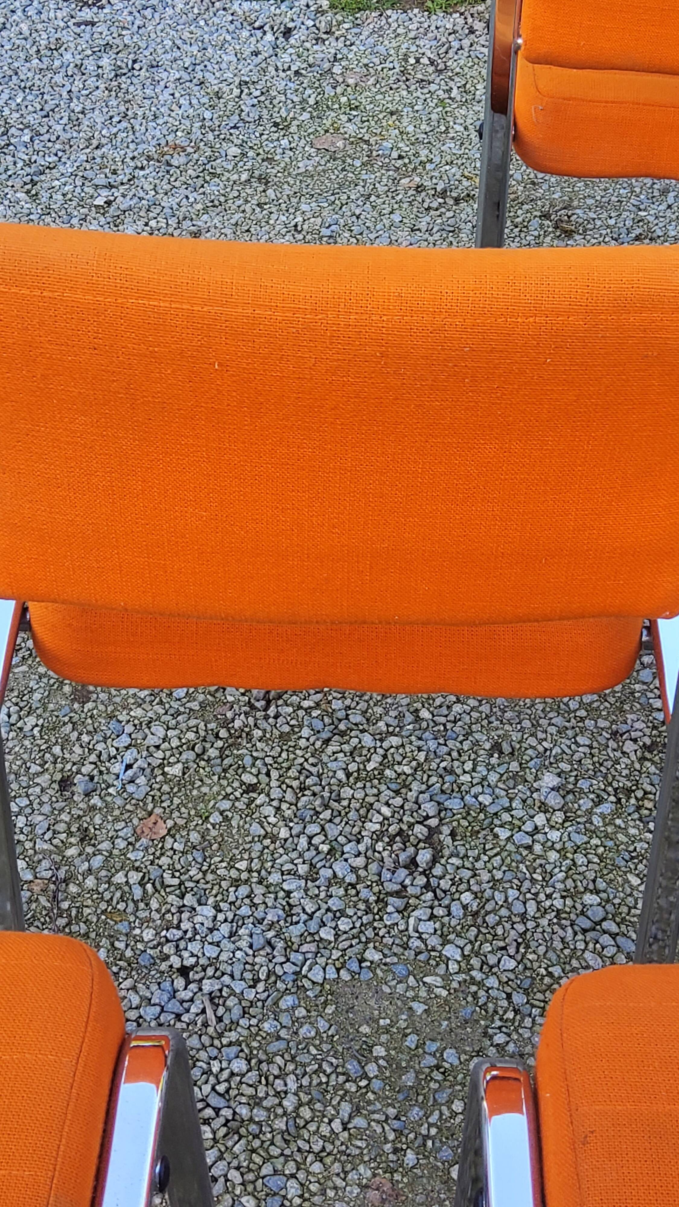 Set of 6 designer chairs from the 70s orange fabrics and chrome tubes