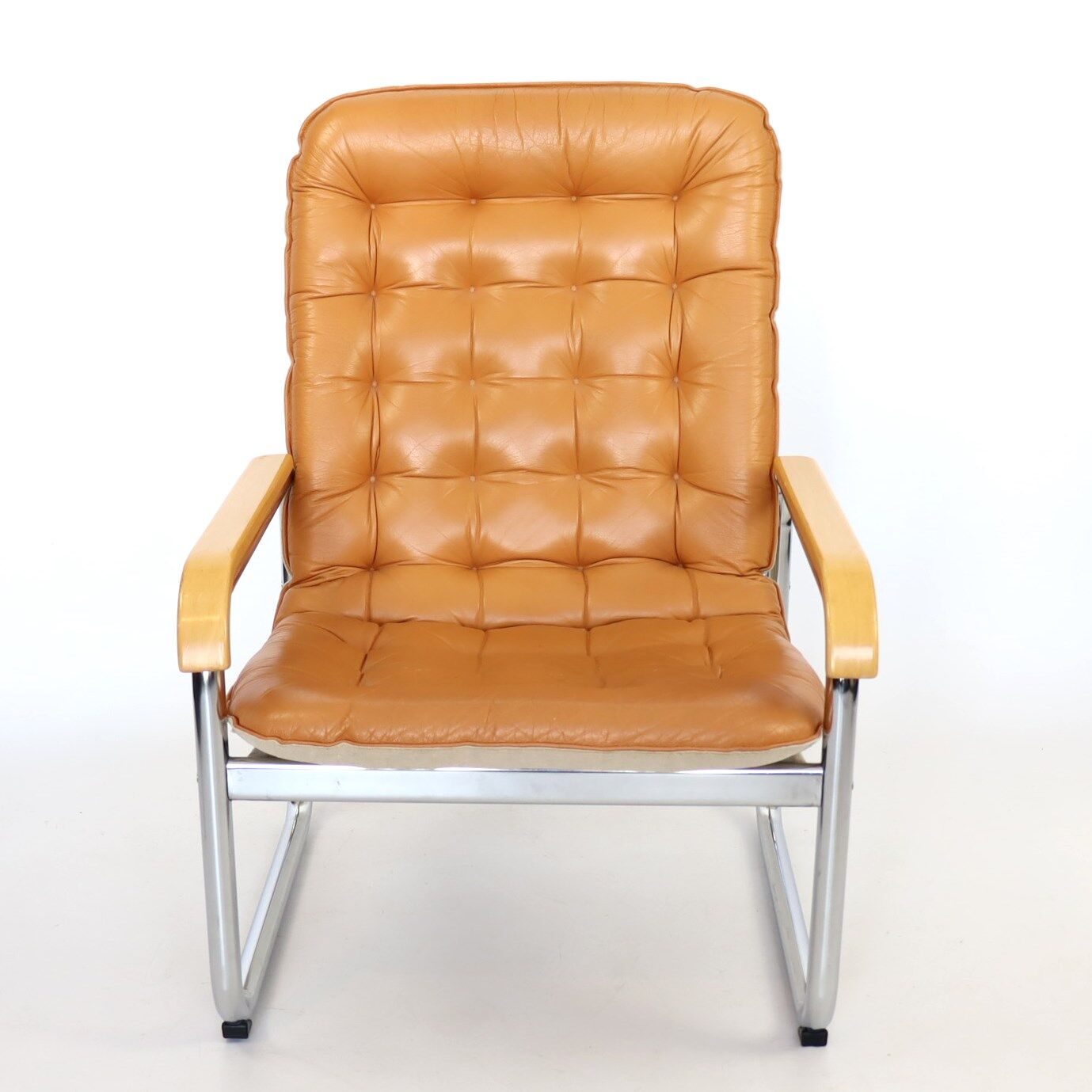Leather and chrome armchair 70s