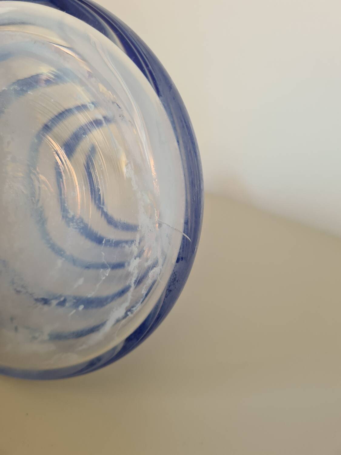 Conical glass vase/carafe blown with a blue spiral decoration.