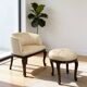 An antique Italian bar chair and a matching tufted vanity stool.