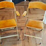 Folding chairs in mustard velvet