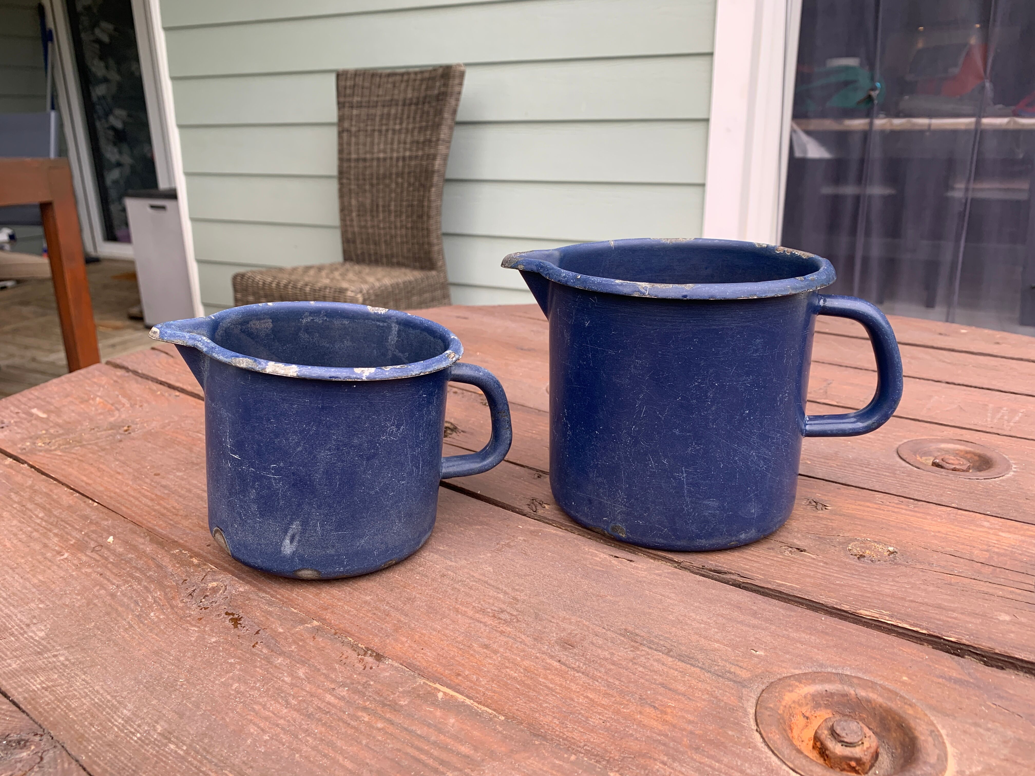 Pair of blue enamelled broc