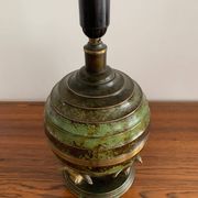 Art Deco table lamp in patinated bronze with eagles holding a globe, France 1940.