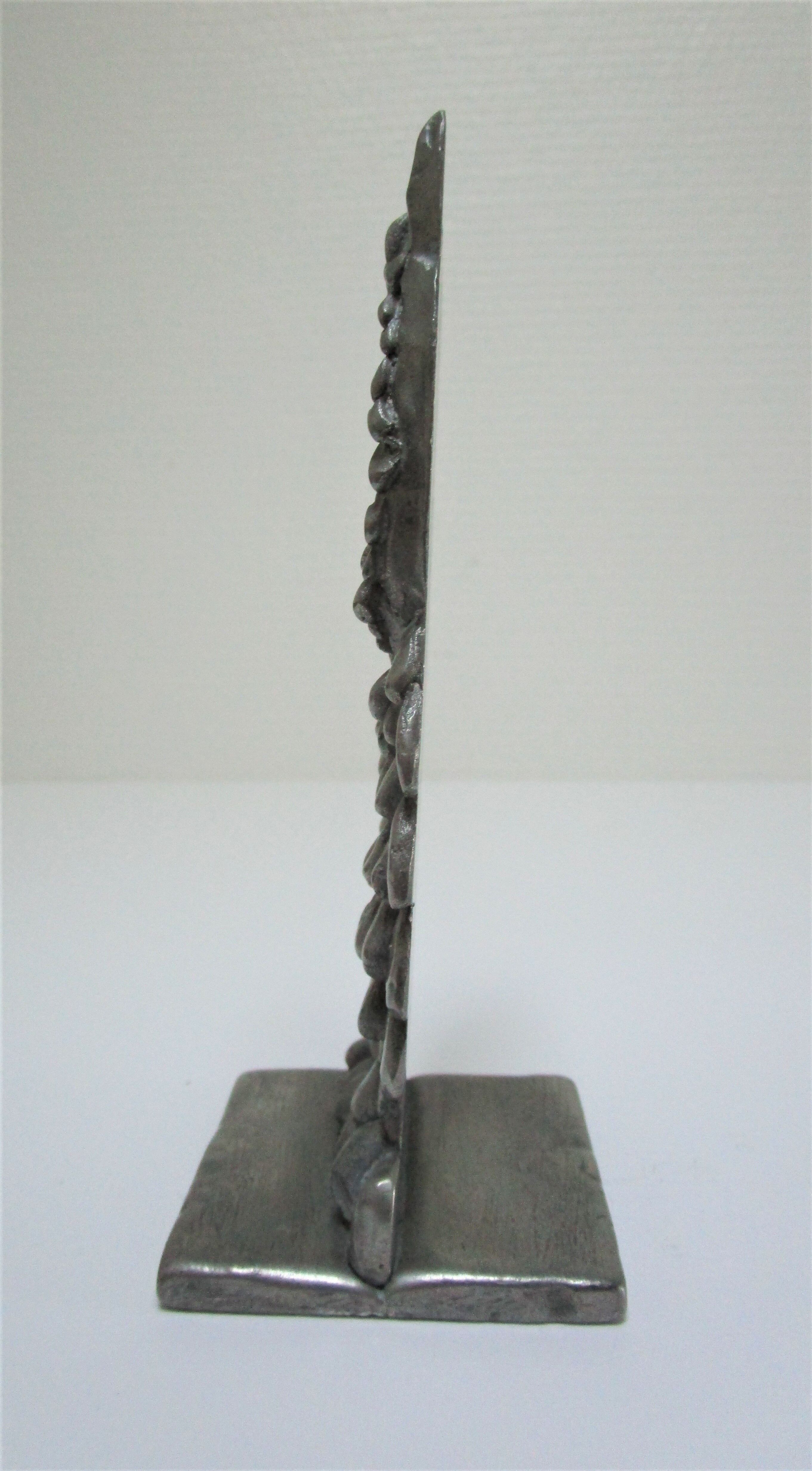 Sculptural paper press nice cast aluminum design 70s