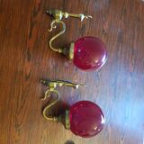 Pair of vintage brass wall light and cherry red globe