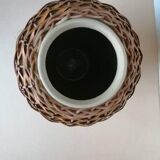 Rattan vase on ceramic