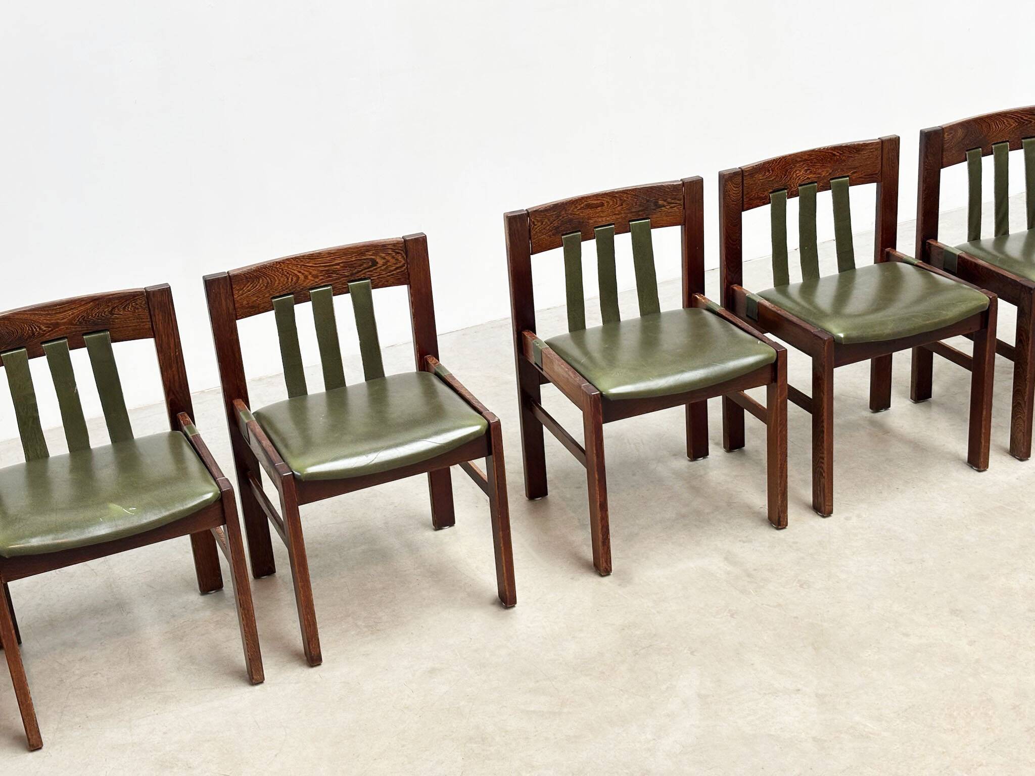 Green leather brutalist dining chairs