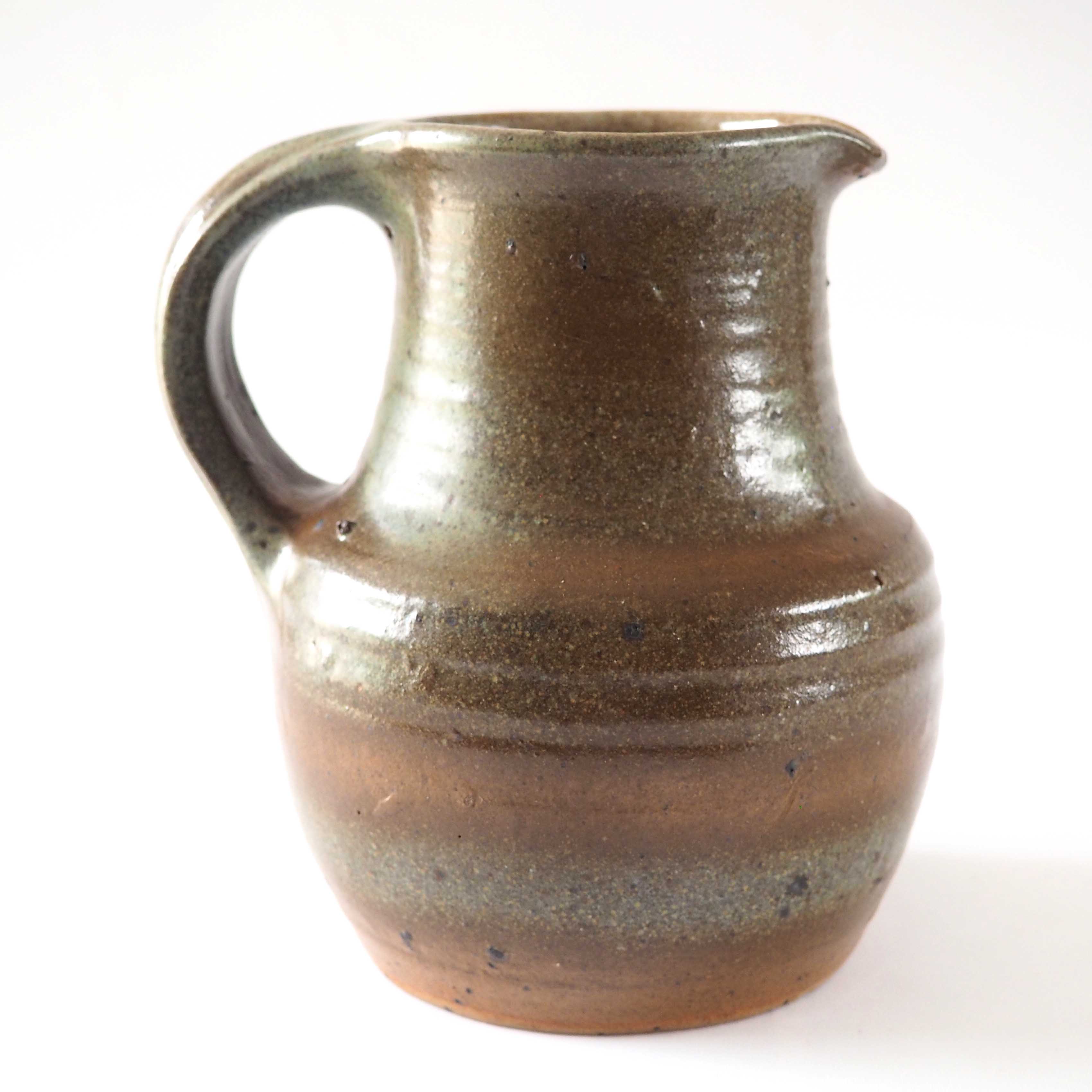Signed stoneware pitcher