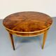 Round walnut Napoleon III extendable table with bronze top in good condition.