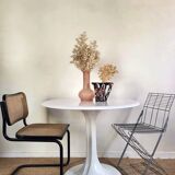 Round tulip-shaped dining table