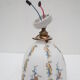 Old wall lamp 45° and its tulip lampshade decorated with flowers
