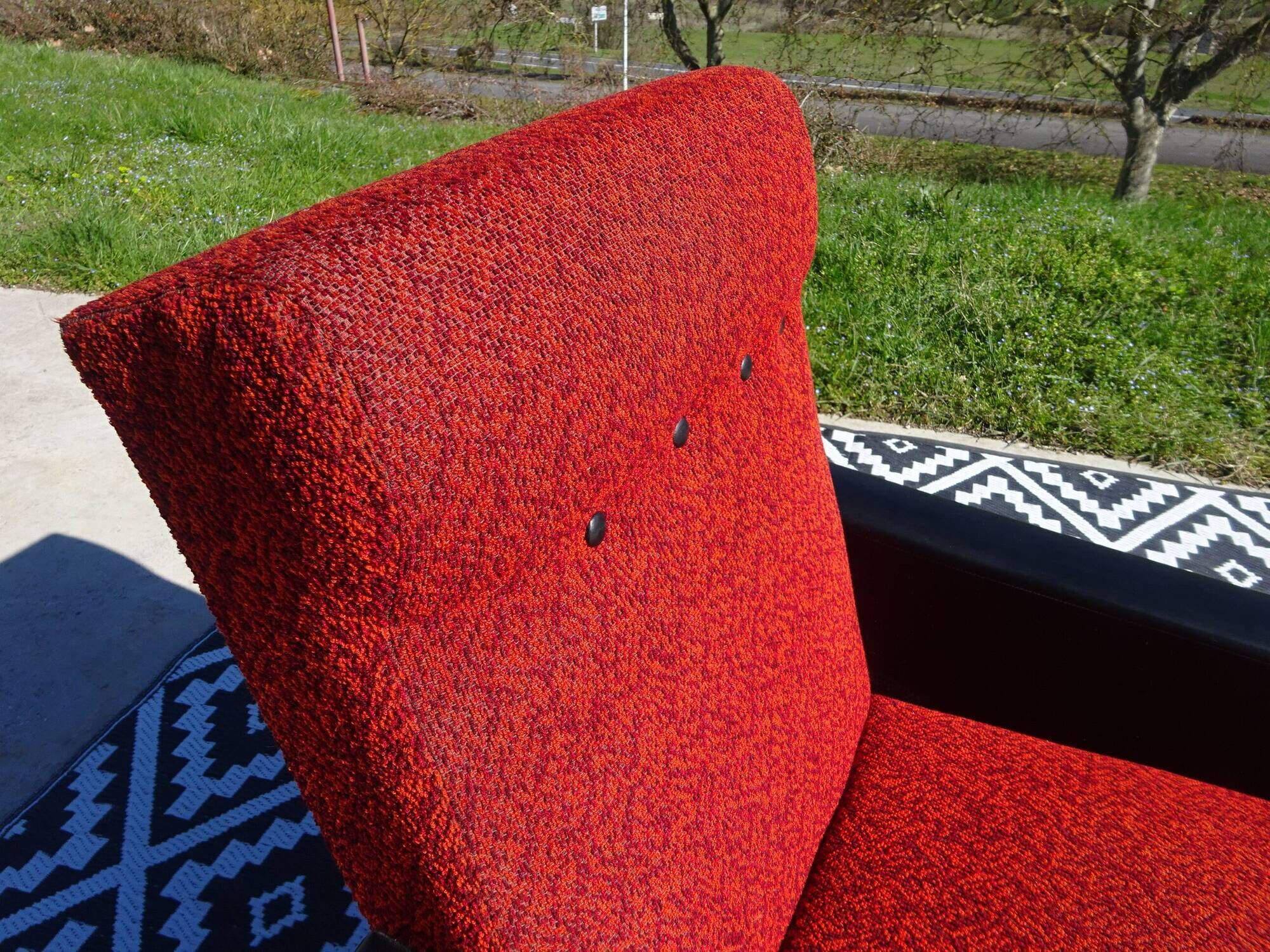 Vintage pair of red and black armchairs