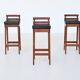 Erik Buck set of three bar stools in teak and leather Dyrlund Denmark 1960