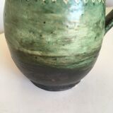 Incised glazed earth pitcher