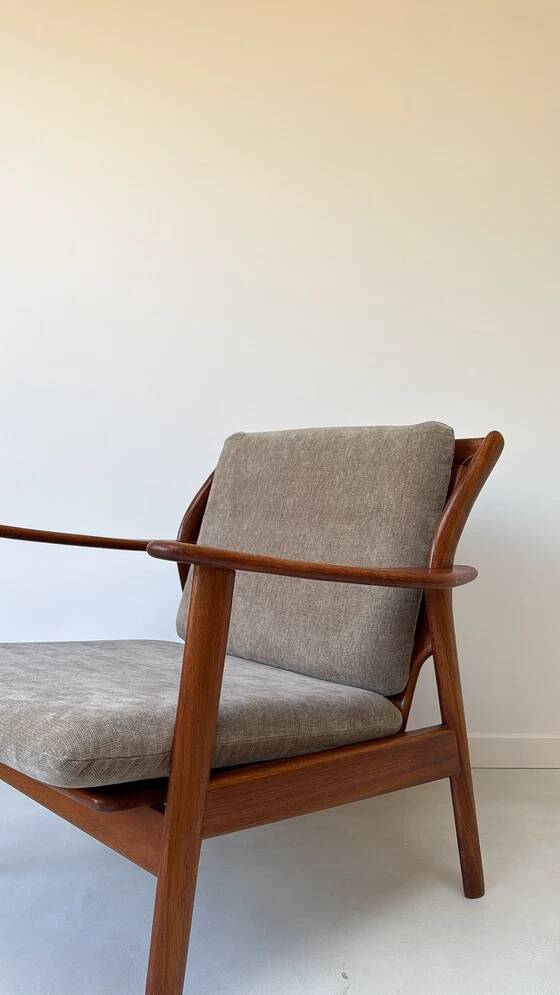 Vintage teak wooden armchair