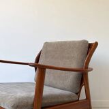 Vintage teak wooden armchair