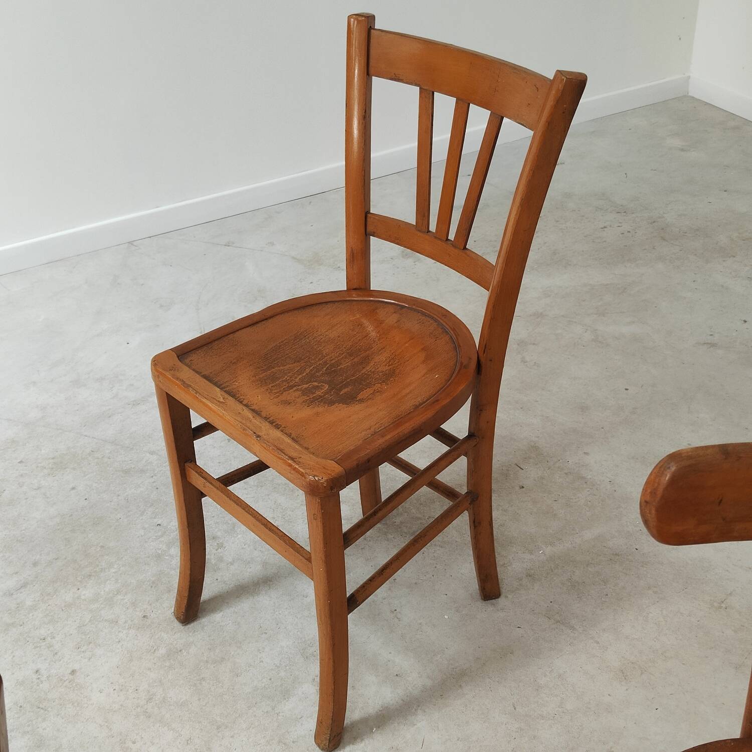 Set of 6 mismatched blond wood bistro chairs