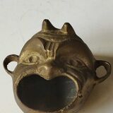 Ashtray/empty pocket devil's satyric head/diablotin, in bronze with golden patina. signed medina iran