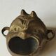 Ashtray/empty pocket devil's satyric head/diablotin, in bronze with golden patina. signed medina iran