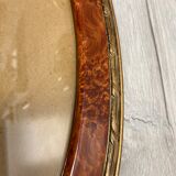 Oval frame imitation magnifying glass