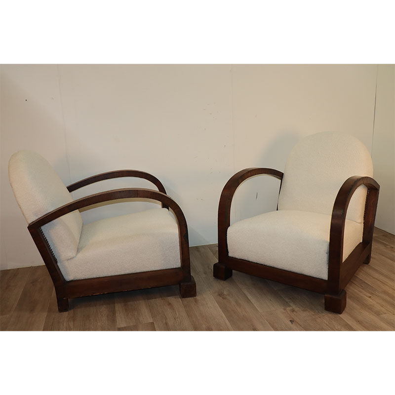 Pair of modernist armchairs in wood and buckle fabric, 1940
