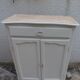 Small buffet, reimagined storage unit in beige.