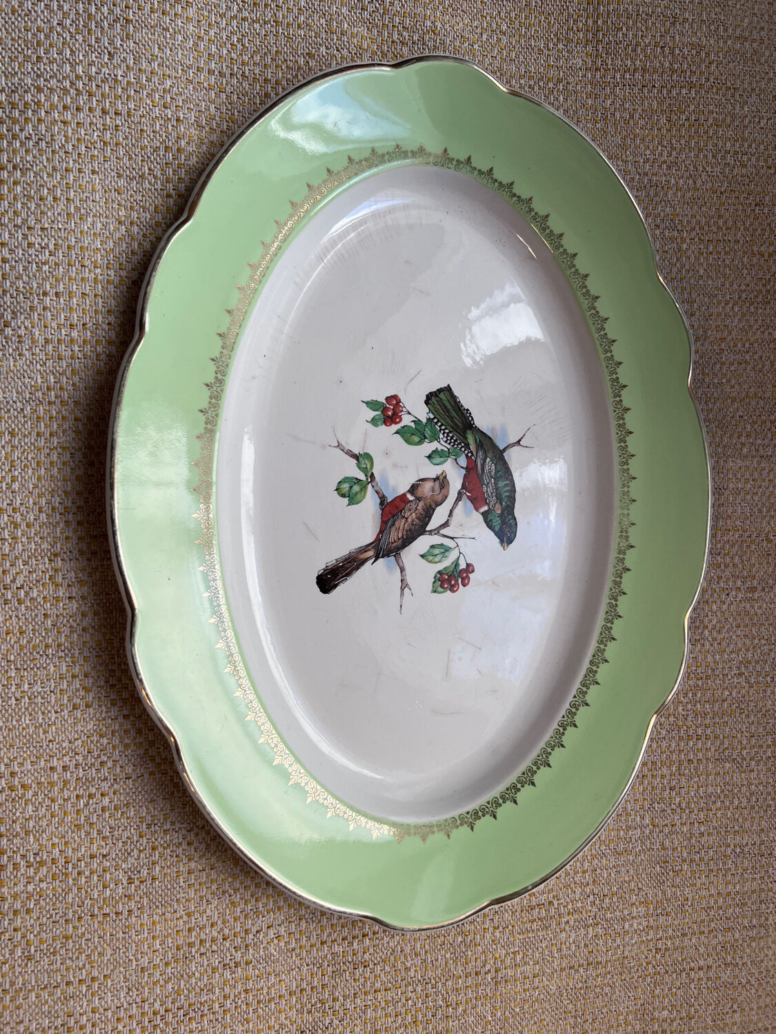 Old oval dish in Badonviller earthenware, decorated with Les Oiseaux.