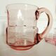 Pitcher and 2 glasses in pink glass