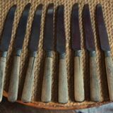 Lot of 8 antique knives with wooden handles.